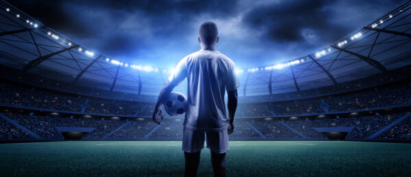 Papier peint Footballeur au stade