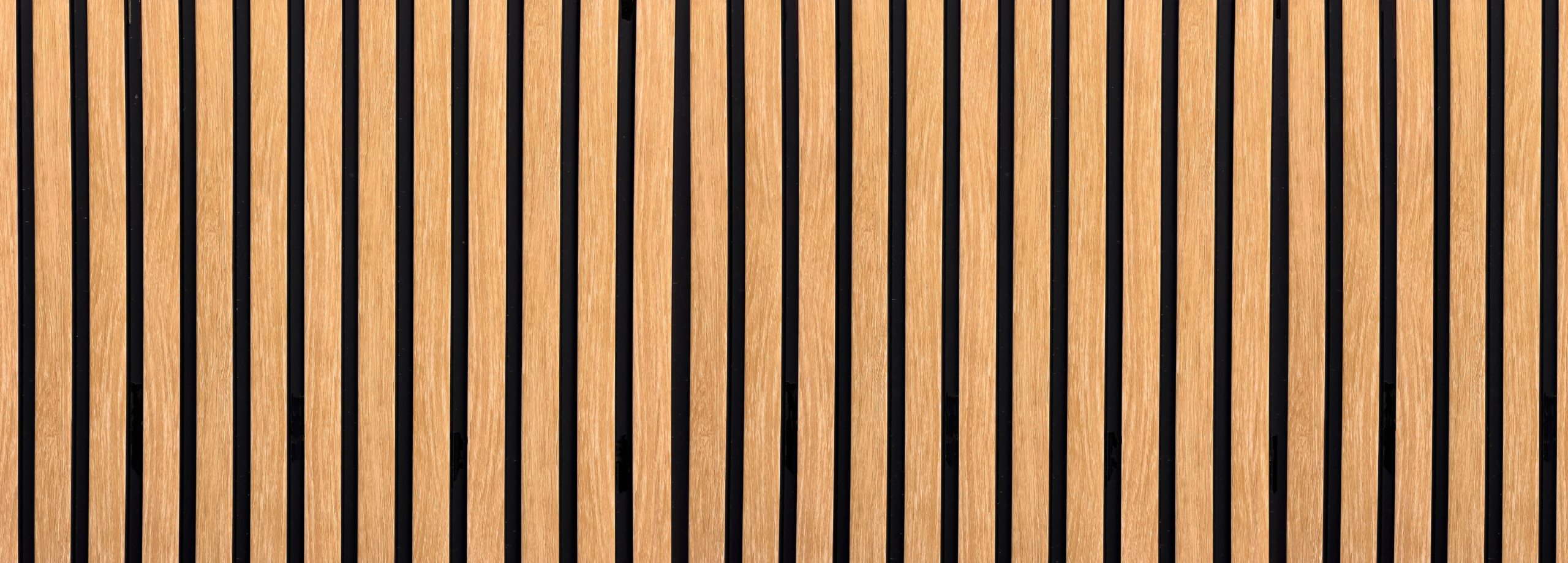 Wooden,Slats,Creating,A,Parallel,Vertical,Pattern,On,A,Black